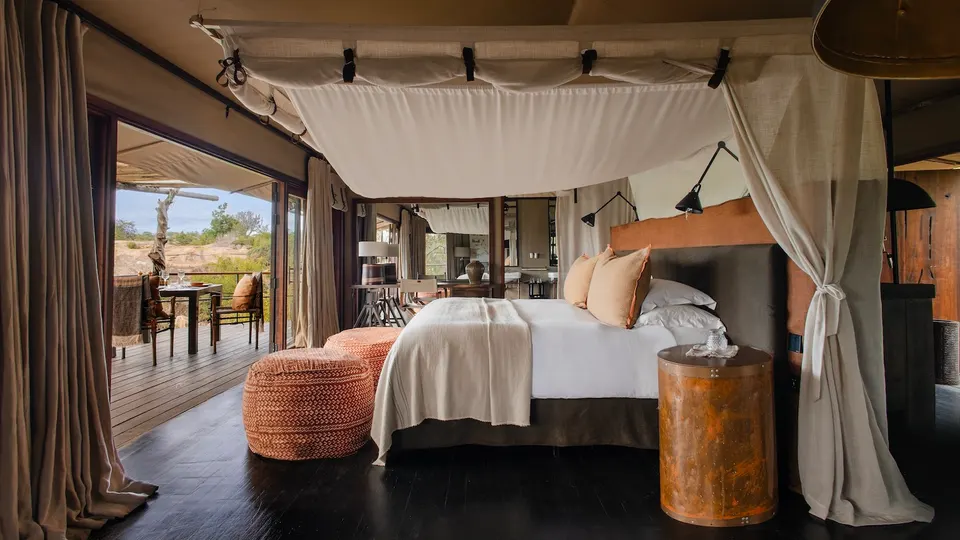 Mwiba Lodge tented-suite bedroom and deck