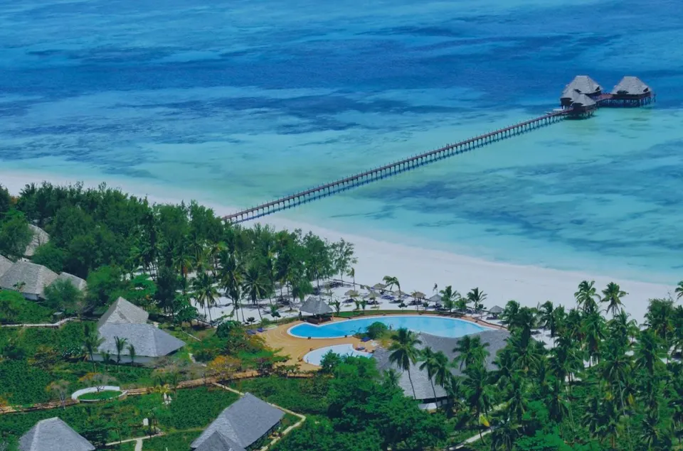 Dongwe Club pool, beachfront and jetty from above