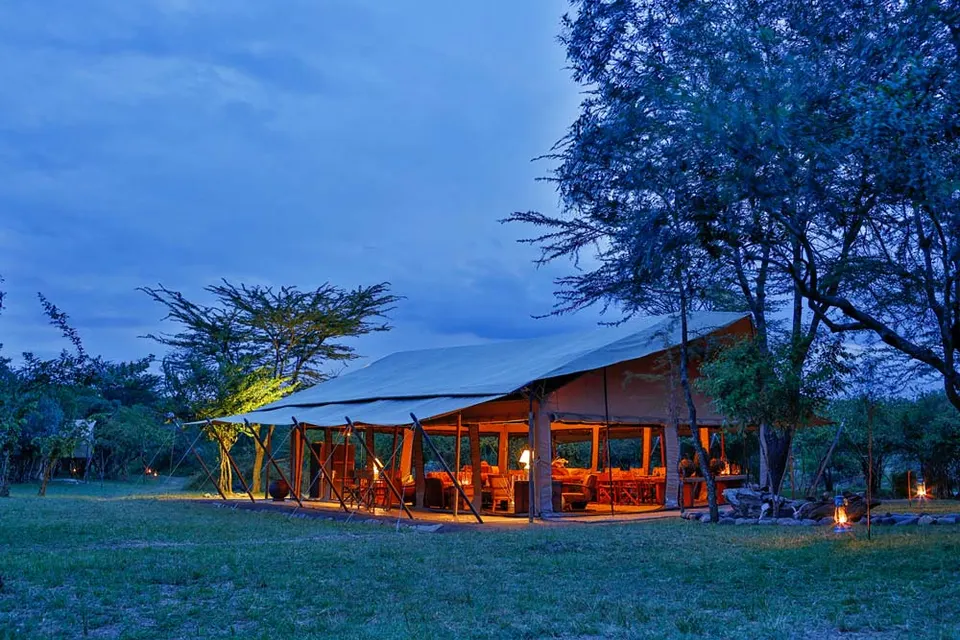 Olengoti main tent and lawn at dusk