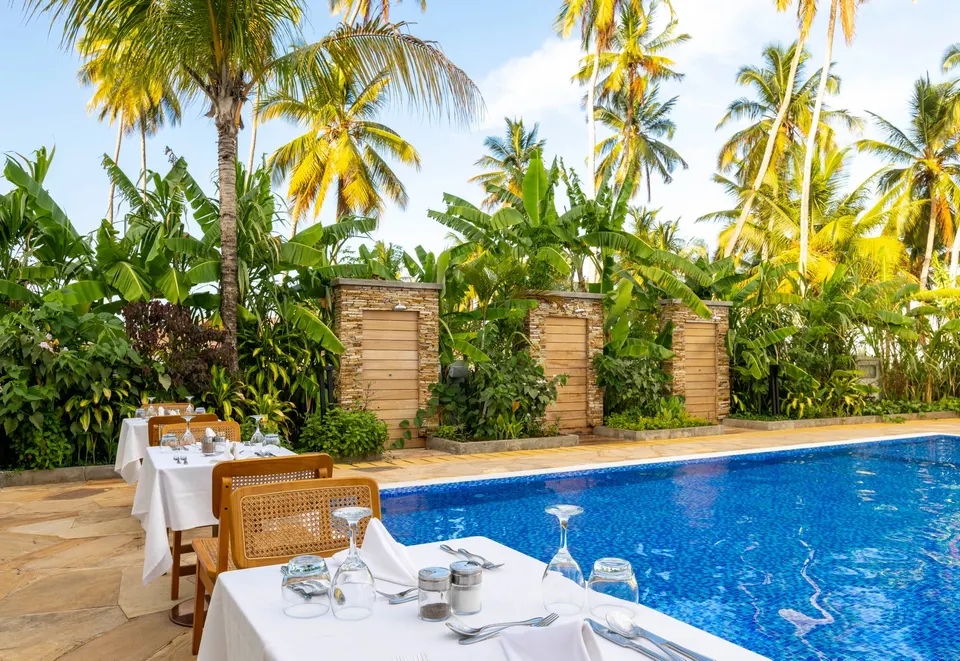 TOA poolside dining setting