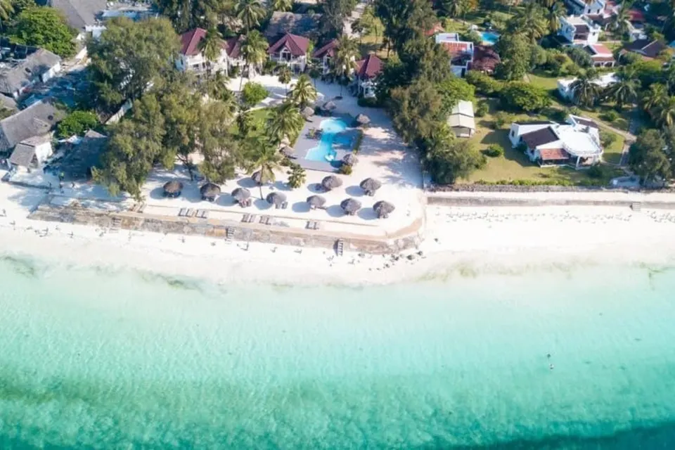 Aerial view of the beachfront hotel and pool