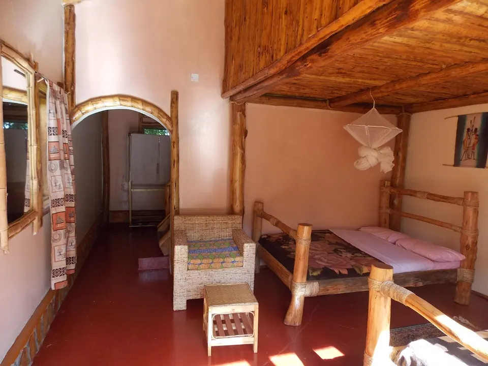 Eden Rock guest-room interior with timber mezzanine and beds