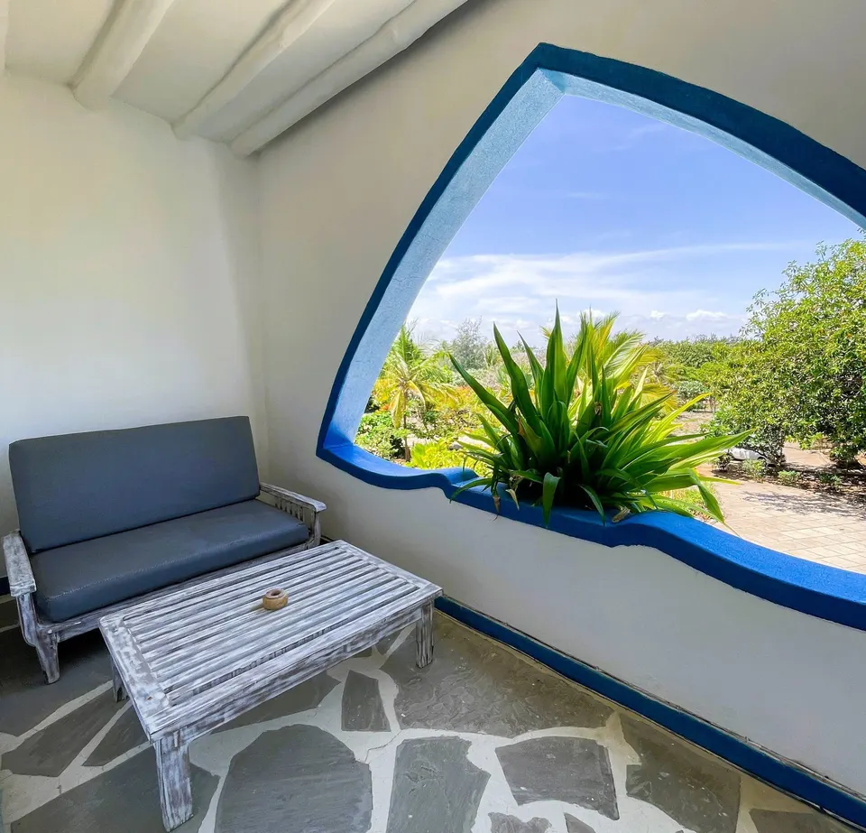 Sun Palm covered room terrace