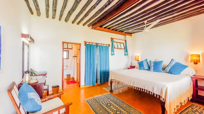Peponi bedroom interior with sitting area