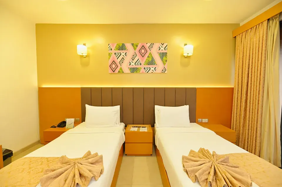 K Hotels Twin Room with two visible beds