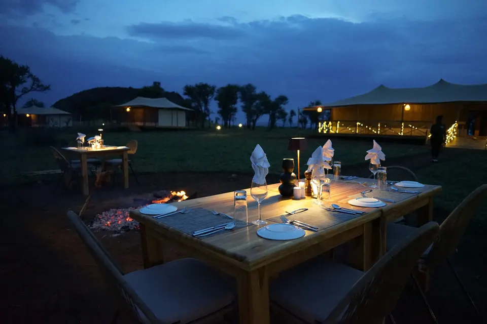 Outdoor dinner setting at dusk
