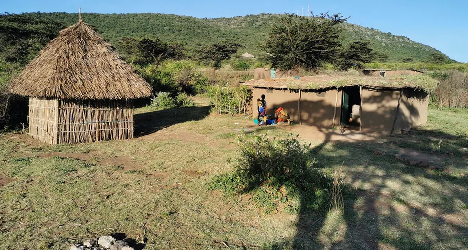 Olonyori house and separate kitchen in village setting