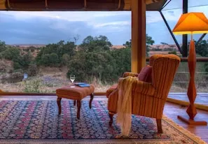 Olare Mara Kempinski indoor seating and landscape outlook