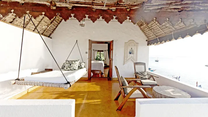 Peponi covered veranda and swing bed