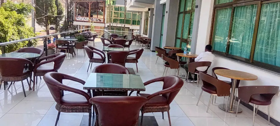 Outdoor terrace with tables and chairs