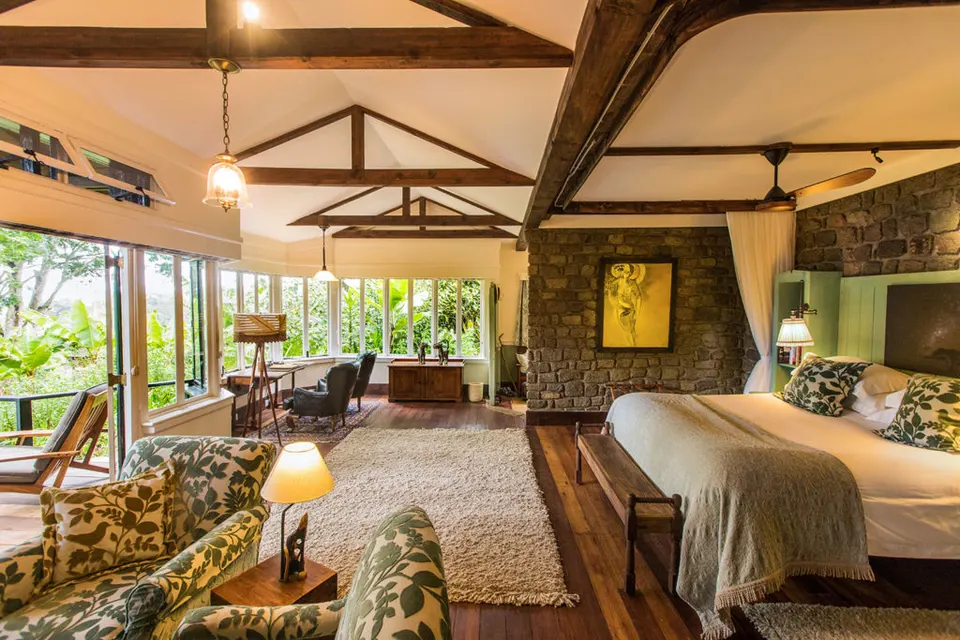 Gibb’s Farm cottage bedroom and living area