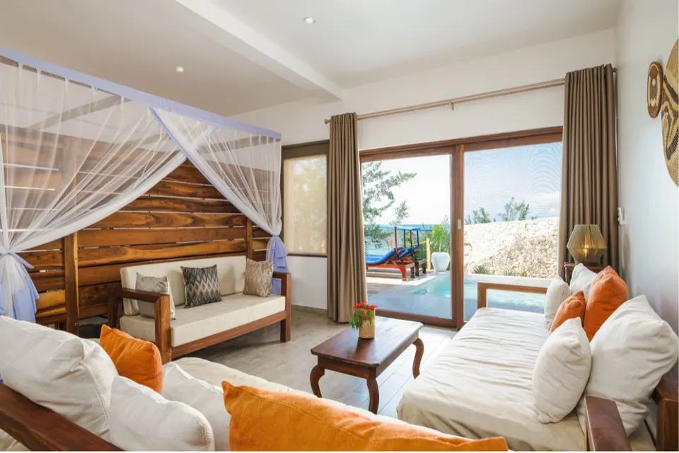 Cliff Ocean Superior Suite interior opening to private pool