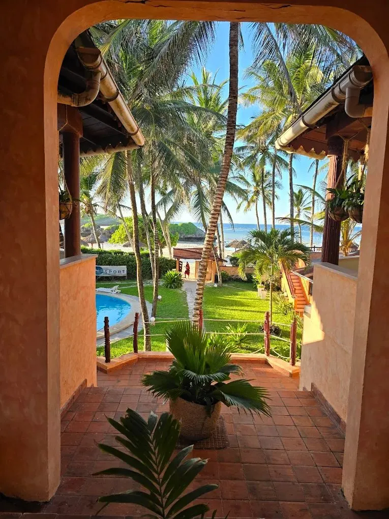 Crystal Bay garden and pool view through an archway