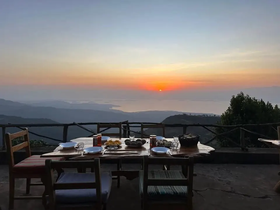Outdoor dining table with highland outlook