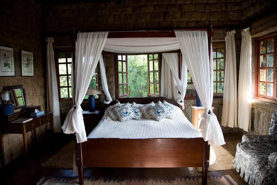 Main-house bedroom with timber panelling