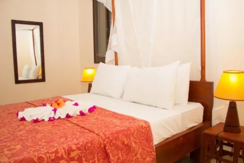 Double-bed room shown by Villa Serenity
