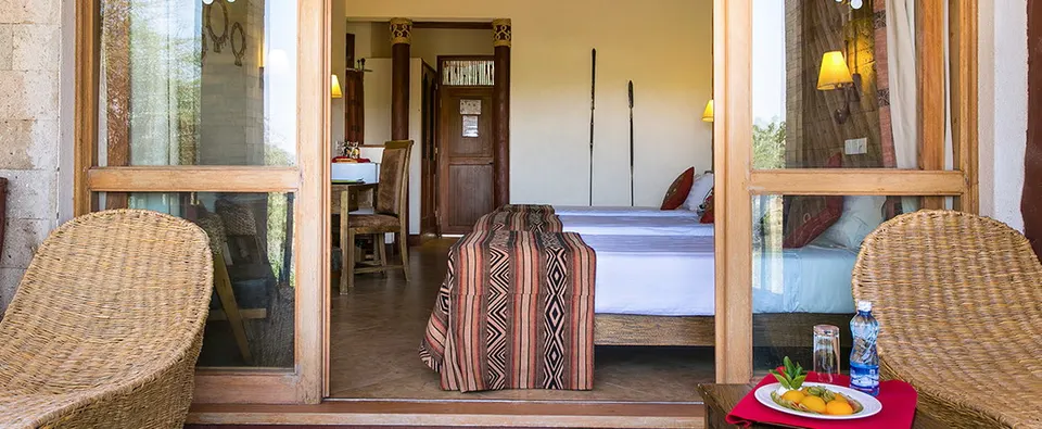 Samburu Simba Lodge view from veranda into bedroom