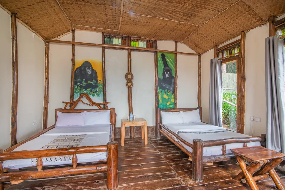 Twin-bed cabin interior at Bakiga Lodge