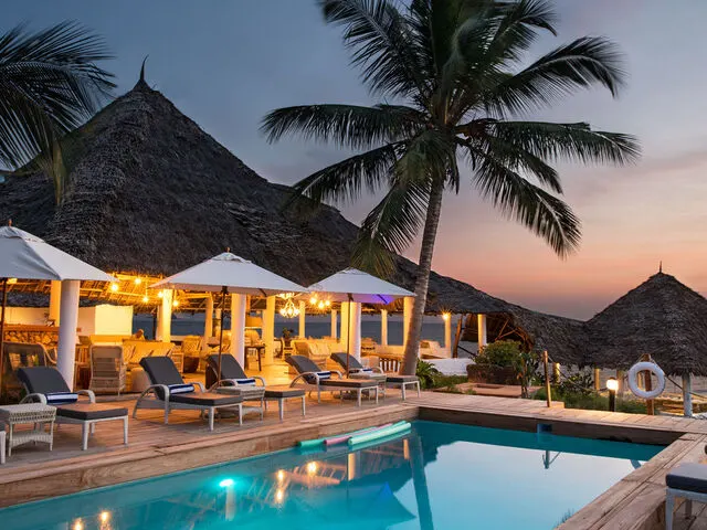 Chuini pool and restaurant at dusk