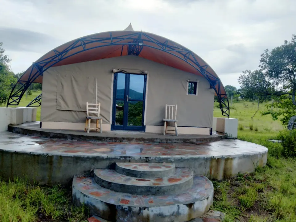 Olorien tent exterior and entrance terrace