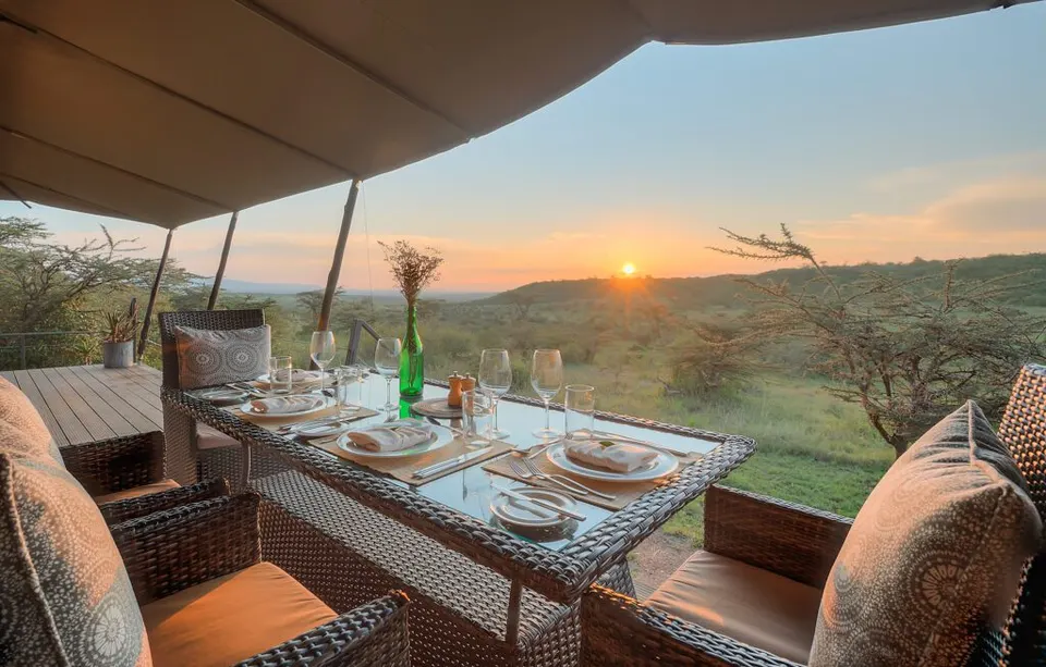 Family-suite veranda dining at sunset