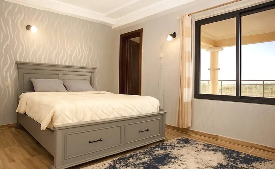 Mara Meguarra bedroom with double bed
