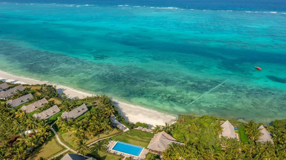 Aerial view of Zawadi villas, pool and coast