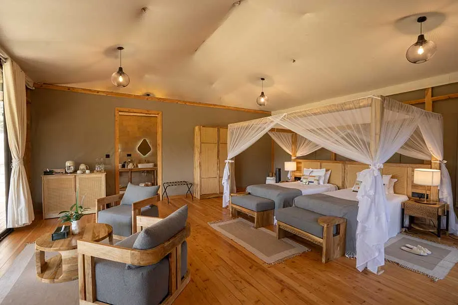 Olkupelia Deluxe Suite sleeping and lounge area