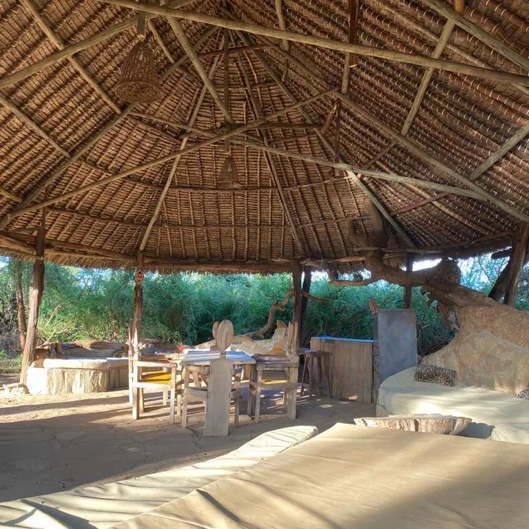 Lion King Bush Camp thatched communal dining interior