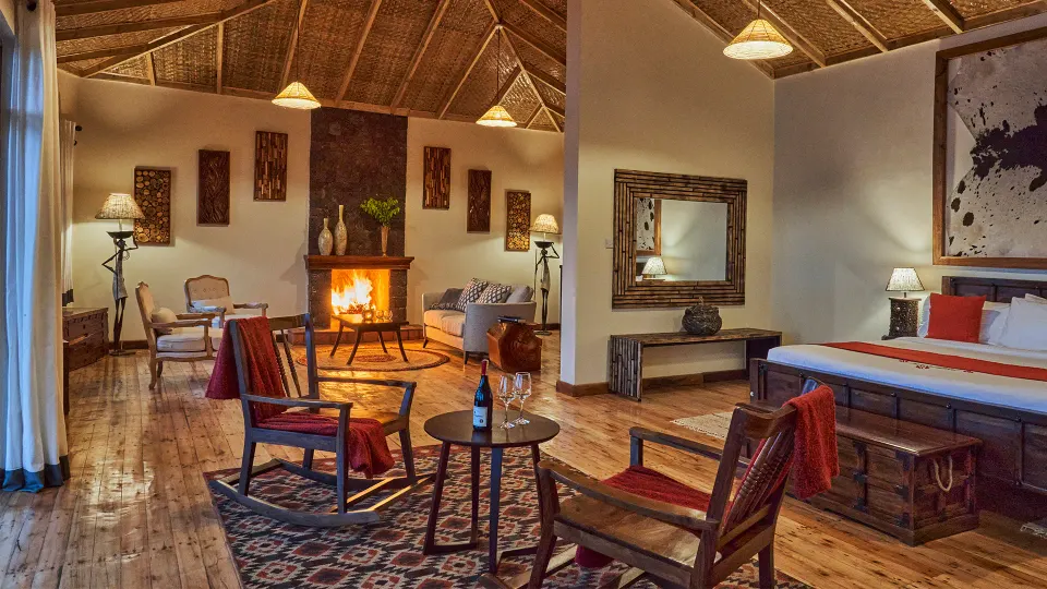 Luxury Forest Suite lounge with fireplace