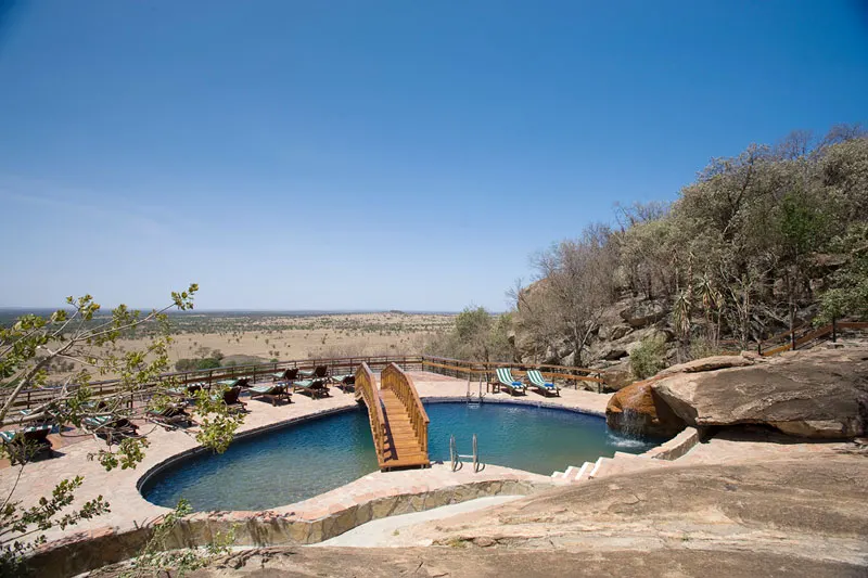 Pool built around the rocky outcrop