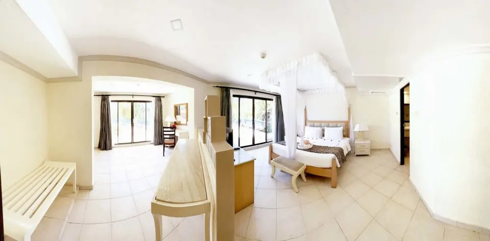 Diani Reef Penthouse suite living and bedroom area