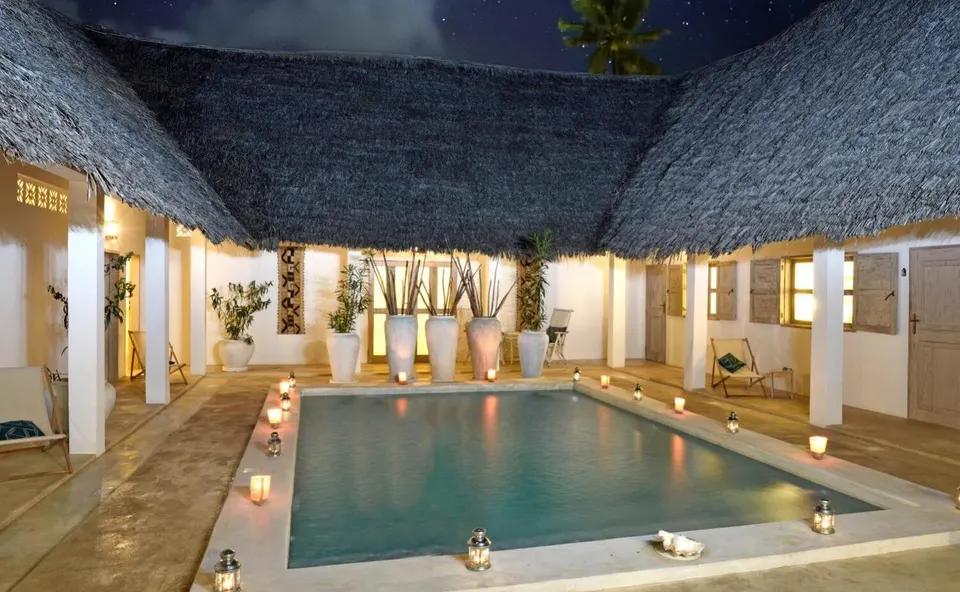 Villa courtyard pool at dusk