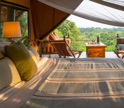 Semliki tent bedroom looking onto private veranda; public inline preview