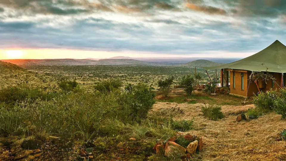 Lodo Springs tent exterior and landscape