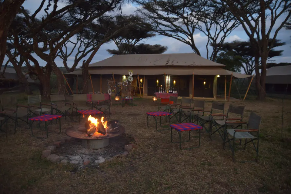 Ngorongoro Kuhama communal tent and evening campfire