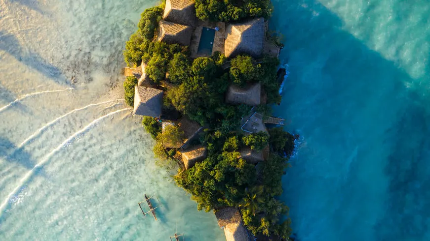The Island Pongwe coral islet and villas from above