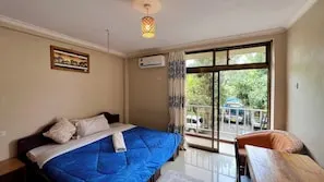 Guest sitting room with blue sofa