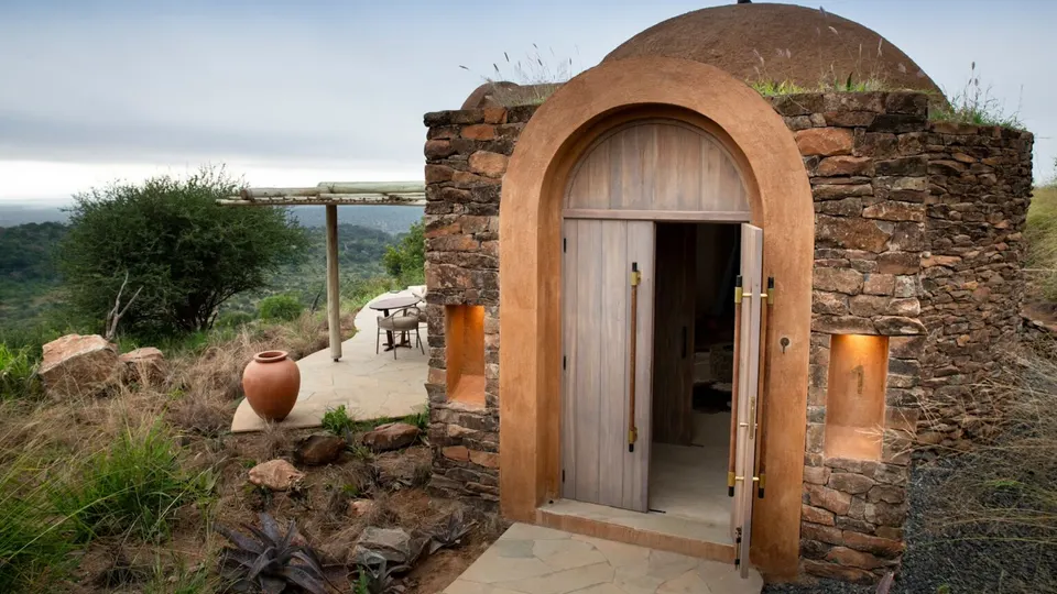 Suyian Lodge stone doorway and suite exterior detail