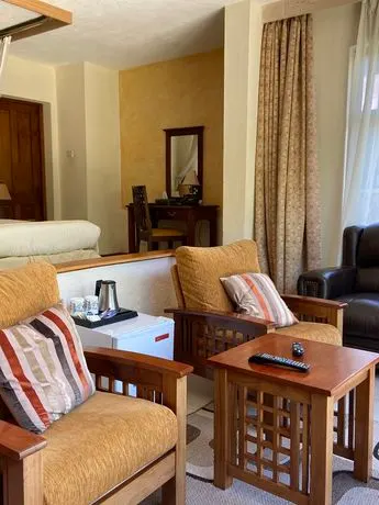 Longonot Villa seating area and bedroom