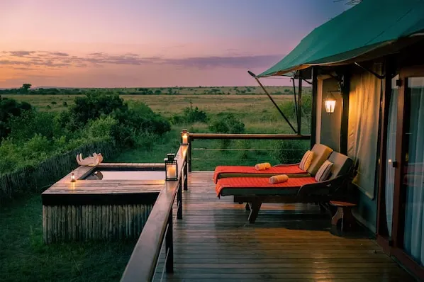 Olare Mara Kempinski private deck and plunge pool at dusk
