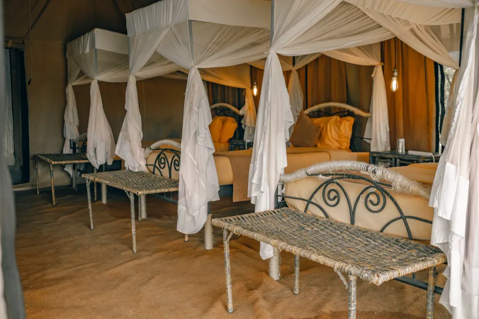 Serengeti Wild Camp triple-room interior