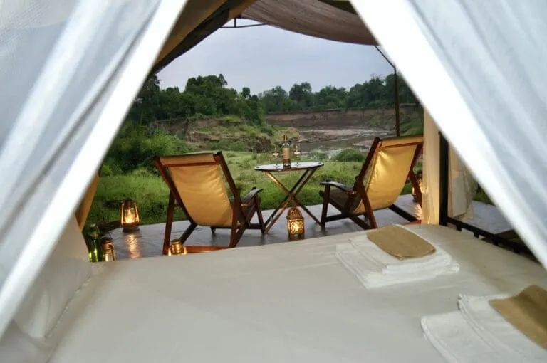 Sentinel Mara Camp view from bed through veranda toward river
