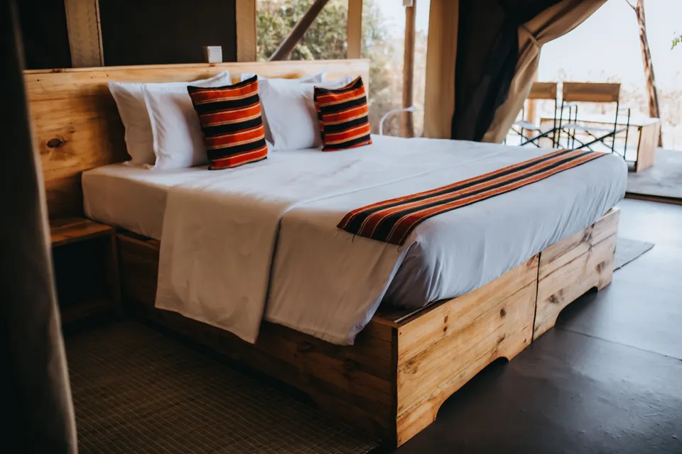 Akagera Rhino Lodge bedroom facing a private veranda