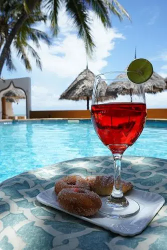 Poolside drink with ocean outlook