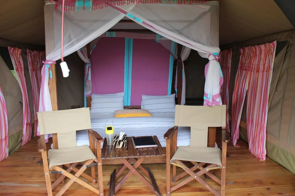 Ndutu Tingitana tent bedroom and seating