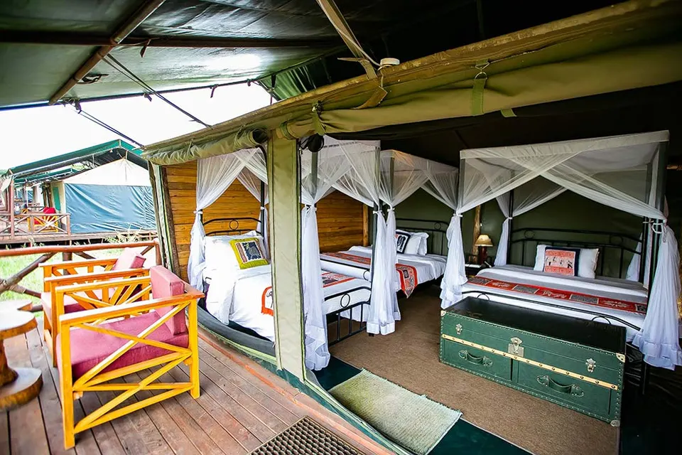 Heritage central camp triple-bed tent interior