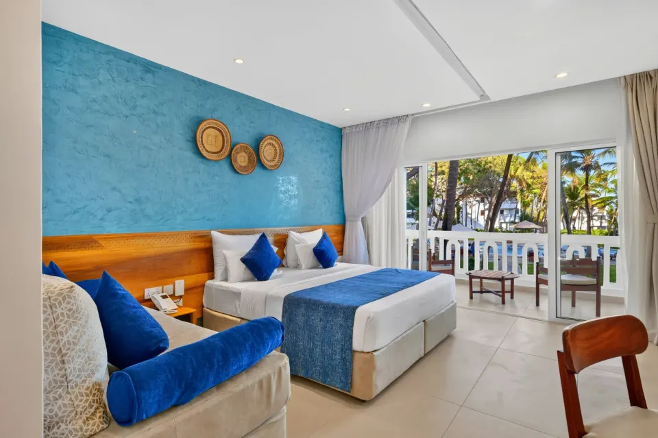 PrideInn Flamingo room interior and balcony