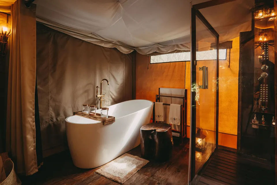 Bathroom with bathtub and shower
