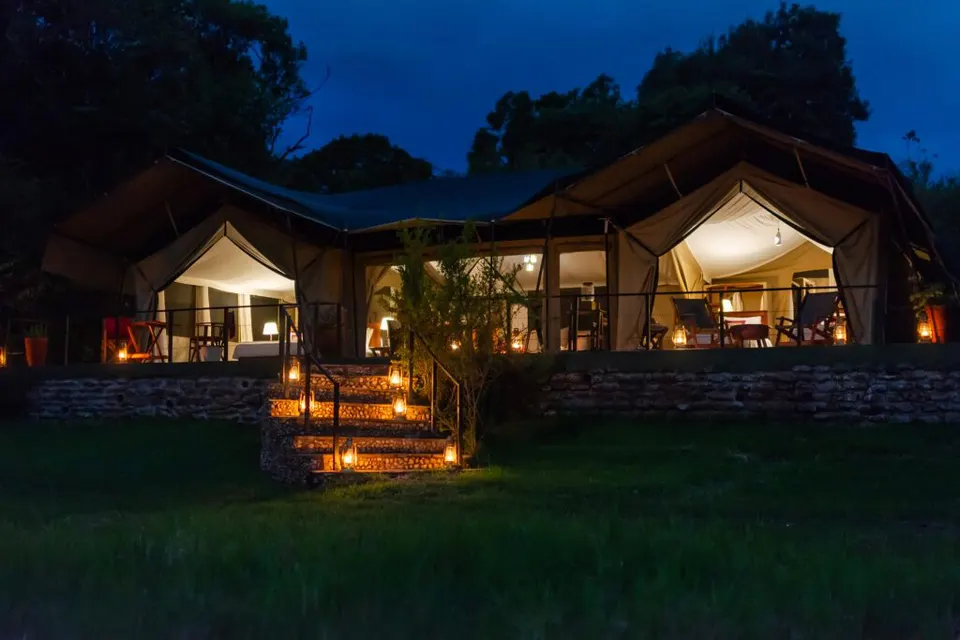 Kicheche Mara North family-suite exterior at dusk